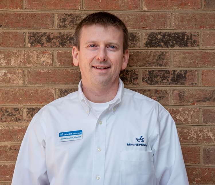 Pharmacist offering clinical consultation.