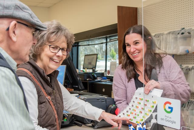 Shelves of wellness products at Mint Hill Pharmacy.
